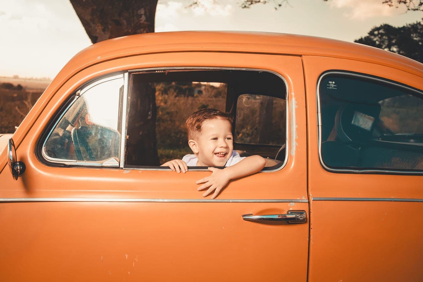 A view through a car window on a family journey
