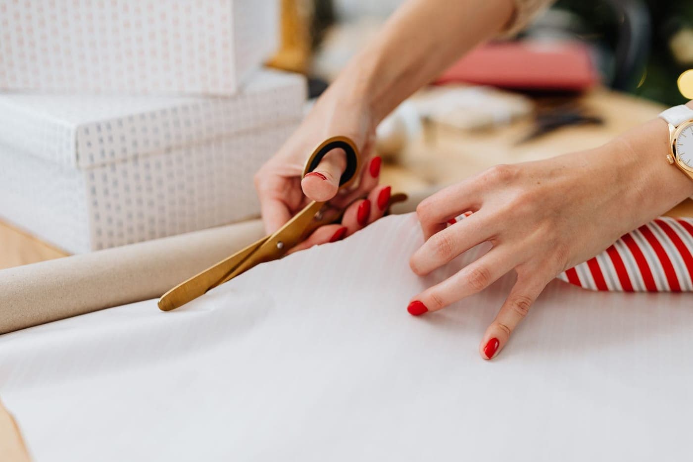 A gift being wrapped on a table